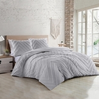 Comfortabele dekbedovertrekset in grijs, ideaal voor een stijlvolle en rustgevende slaapkamer.