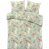 Bloemrijke groene beddengoedset met een bijpassend kussensloop, ideaal voor een levendige slaapkamer.
